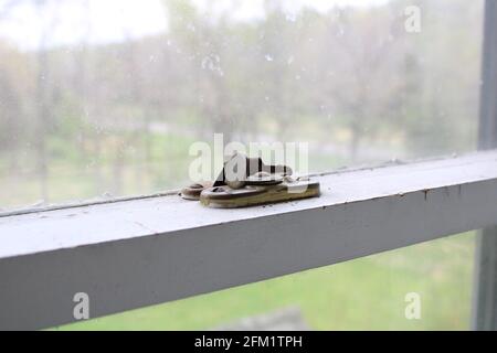 An Metal Lock on an Old Window Stock Photo