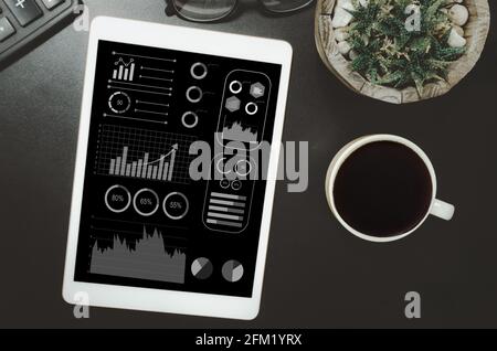 Business graphs and tablet charts analyze financial statements. Marketing and profit and loss in business plan. top view Stock Photo