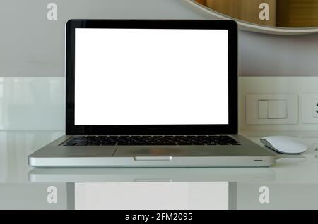 computer laptop mock up and mouse white blank screen on table. Stock Photo