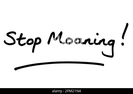 Stop Moaning! handwritten on a white background. Stock Photo