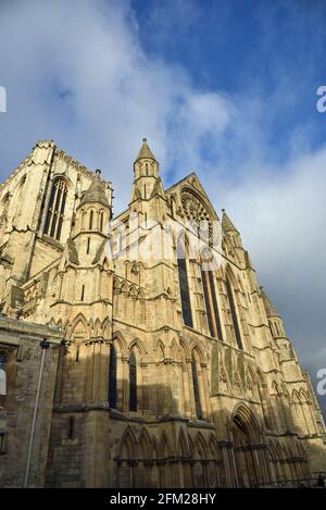 The Rose Window high in the gable of the South Transcept of York Minster, with the central tower in background York, North Yorkshire, United Kingdom Stock Photo