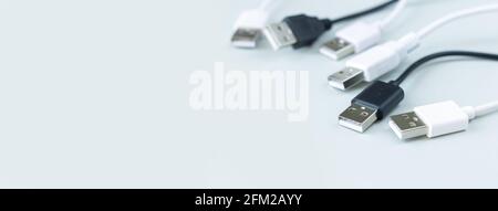 Different charging or data transmission plugs adapter from USB on gray background Stock Photo