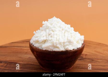 Freshly Churned White Butter Also Known As Safed Makhan Malai Or Homemade Makkhan In India Is Used To Prepare Desi Ghee In Wooden Bowl. Isolated On Be Stock Photo