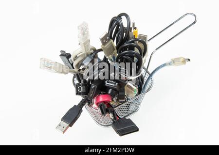 technological waste that remains in residence as computer cables Stock Photo