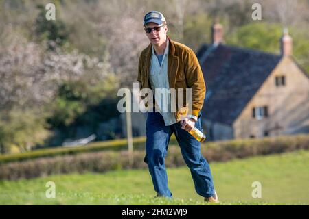 Actor Benedict Cumberbatch enjoys a bottle of cider on Burrow Hill in Somerset on Saturday evening after the final day of filming for Doctor Strange 2. Stock Photo