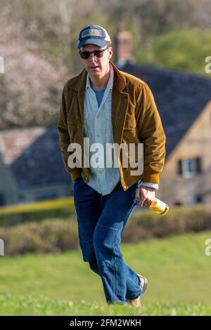 Actor Benedict Cumberbatch enjoys a bottle of cider on Burrow Hill in Somerset on Saturday evening after the final day of filming for Doctor Strange 2. Stock Photo