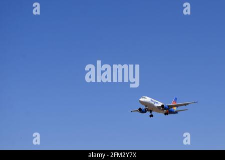 Fresno United States May 03 21 A Photo Of Alaska Airlines In Departure Flying Against A Bright Clear Blue Sky Background May 21 Stock Photo Alamy