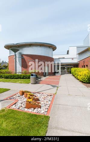 The Anacortes Public Library exterior showing the rotunda in Anacortes, Washington.  Shows unusual funnel-shaped downspout. Stock Photo