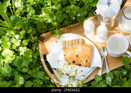 Breakfast for two on the lawn in the garden Stock Photo