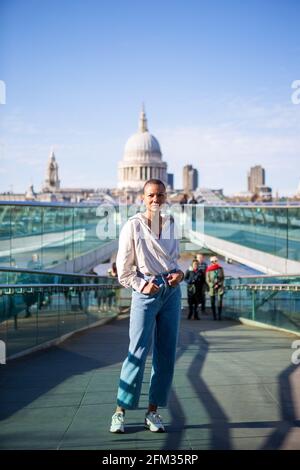 London, UK. 18th Apr, 2021. A model wearing a white shirt and Jeans, Reebok trainers during a street style photoshoot in central London. Credit: Pietro Recchia/SOPA Images/ZUMA Wire/Alamy Live News Stock Photo