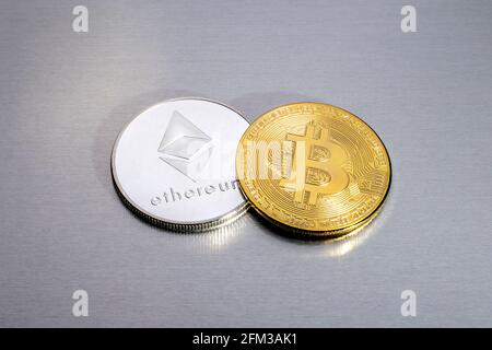 Bitcoin and ethereum (ether) token coins Stock Photo