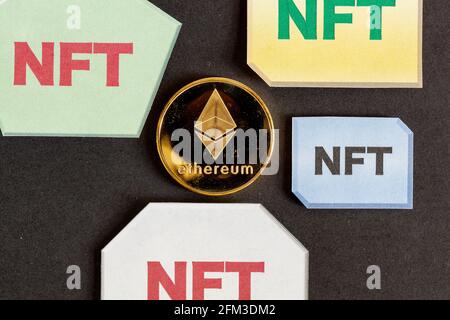 A concept image for investing in Non Fungible Tokens (NFTs) through Ethereum blockchain. These are rare digital items that are traded online. Image sh Stock Photo