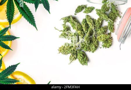 Cannabis Terpene concept with leafs lemon orange Marijuana flower buds Stock Photo