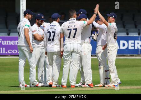 Jesse Ryder of Essex (77) is congratulated by his team mates after taking the wicket of Dinesh Chandimal of Sri Lanka during Essex CCC vs Sri Lanka, T
