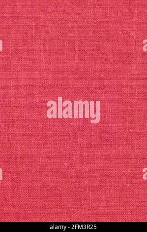 Natural light vibrant wine red rustic flax fiber linen fabric swatch texture horizontal pattern, vertical bright rough detailed vintage textile Stock Photo