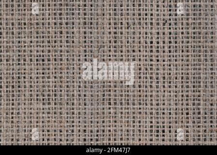Top view of natural grey hessian or burlap cloth or gunny sack, formed of jute. Abstract texture background Stock Photo