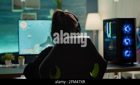 Pro woman egame cyber playing online with virtual reality headset and  wireless controller. Virtual space shooter championship in cyberspace,  esports player performing on pc during gaming tournament Stock Photo - Alamy