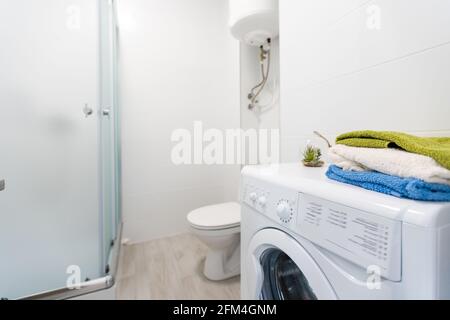 Modern white washing machine front panel with display Stock Photo