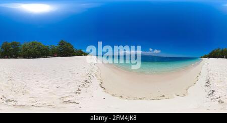 Tropical landscape: small island with beautiful beach, palm trees by turquoise water view from above. Great Santa Cruz island. Zamboanga, Mindanao, Philippines. Stock Photo