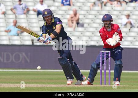 Laurie Evans in batting action for Warwickshire as James Foster looks on from behind the stumps during Warwickshire vs Essex Eagles, Royal London One- Stock Photo