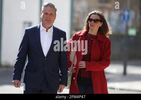 Britain's Labour Party leader Keir Starmer and his wife Victoria walk to a polling station during local elections, in London, Britain May 6, 2021. REUTERS/Tom Nicholson