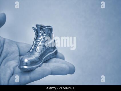 Object in the form of a boot printed on a 3d printer and covered with enamel Stock Photo