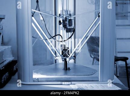 The process of working 3D printer and creating a three-dimensional object Stock Photo