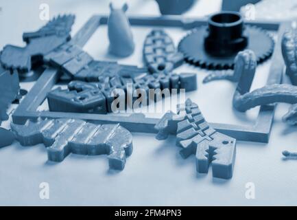 Models printed by 3d printer. Bright colorful objects printed on a 3d printer Stock Photo