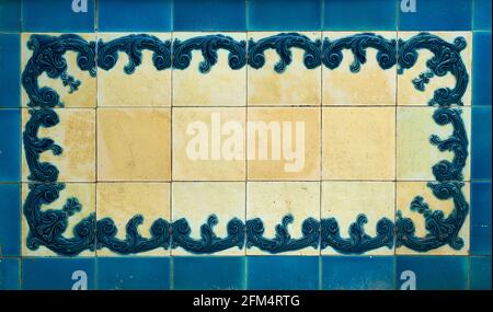 Decorative Victorian ceramic tiles with blue pattern and white background Stock Photo