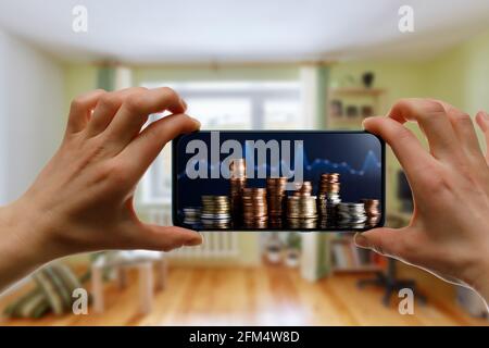 Online bank concept. Using money at app account at home Stock Photo