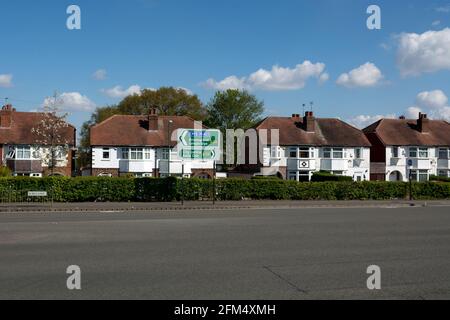 Semi-detached houses on the A38 road, Northfield, Birmingham, West Midlands, England, UK Stock Photo