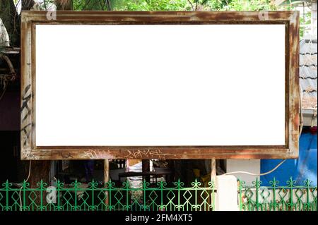 Blank advertising billboard with rusty frame on a dirty grunge Stock Photo