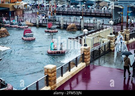 URAYASU, CHIBA, JAPAN - Sep 25, 2020: A distant shot of the Aquatopia ride in the Port Discovery Attraction Area of Tokyo Disney Sea in Urayasu, Chiba Stock Photo