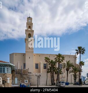 Jaffa, Israel - March 31st, 2021: A side view of the St. Peter's church in old Jaffa, Israel, on a partially cloudy day. Stock Photo