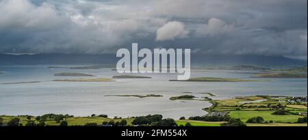 Looking out over Clew Bay with its famous drumlins from the side of Croagh Patrick, County Mayo, Ireland Stock Photo