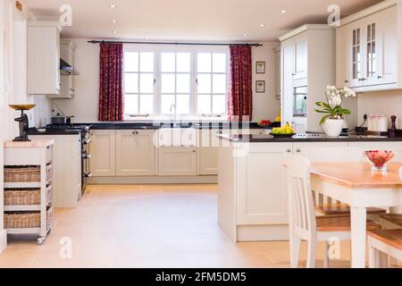 Painted wood shaker style kitchen interior design, UK luxury kitchens Stock Photo