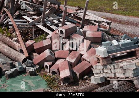 broken building materials made of concrete on a heap on a deserted site Stock Photo
