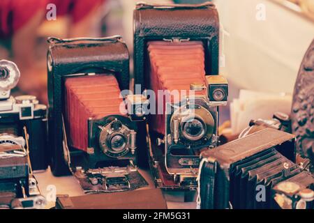 Retro photo cameras in the vintage market (vintage photo effect) Stock Photo