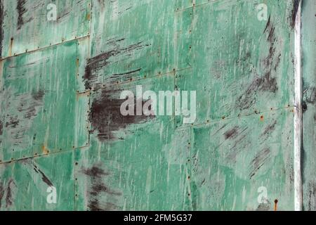Background of oxidized sheets of metal. Galvanized iron. Green iron oxide Stock Photo