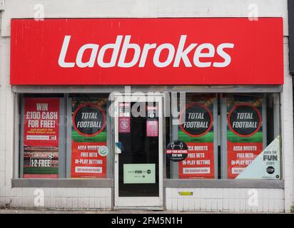 Exterior view of Ladbrokes bettting shop in Bognor Regis.put money on Stock Photo