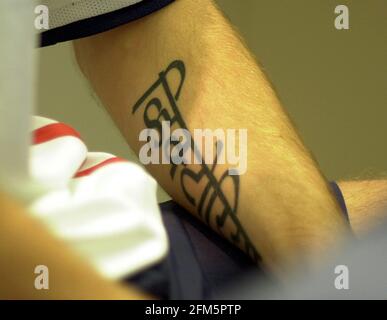 A tattoo is seen on Baltimore Orioles' Robert Andino's arm before a  baseball game against the New York Yankees in Baltimore, Monday, April 9,  2012. (AP Photo/Patrick Semansky Stock Photo - Alamy