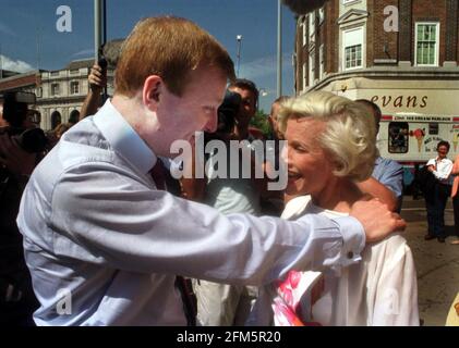 Charles Kennedy walkabout in Kingston May 2001 meeting actress Honor Blackman Stock Photo