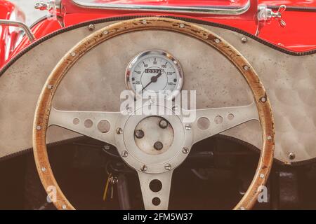 Retro styled image of the interior of a classic red kit car convertible Stock Photo