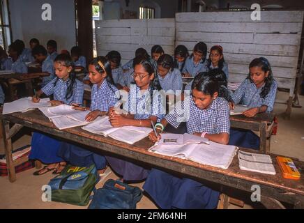 KERALA, INDIA - School girls at the St. Anthony Upper Primary School in the Western Ghats mountains, Kottayam district. Kerala has an exceptionally high literacy rate. Stock Photo