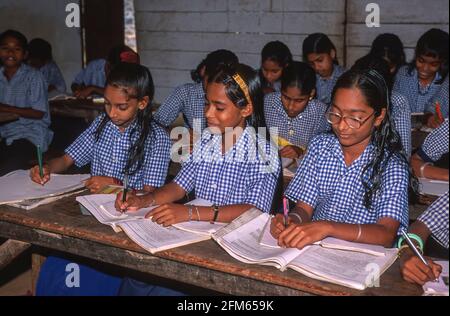 KERALA, INDIA - School girls at the St. Anthony Upper Primary School in the Western Ghats mountains, Kottayam district. Kerala has an exceptionally high literacy rate. Stock Photo