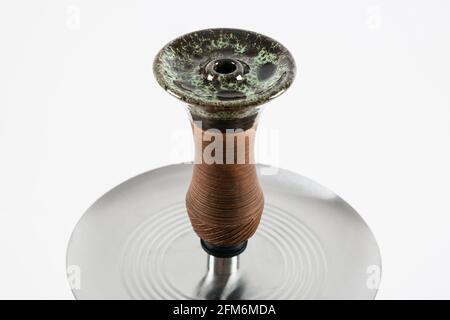 Stylish ceramic hookah bowl on a white background. Stock Photo