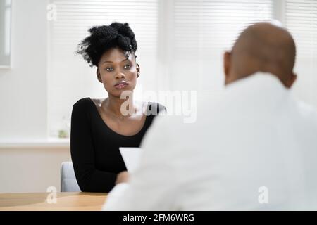 African American Patient At Medical Doctor Office Stock Photo