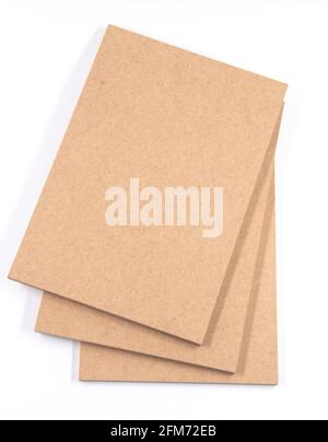 Raw MDF, three brown boards. Stock Photo
