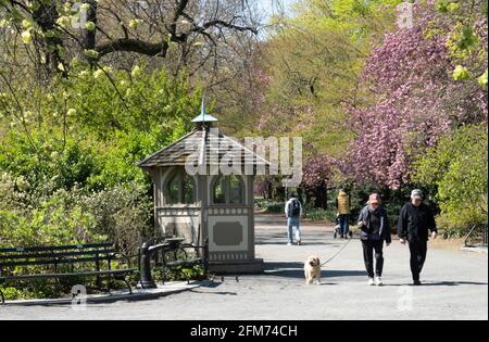 New York City Residents and Tourists Enjoy Central Park in Springtime, USA Stock Photo