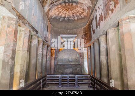 AJANTA, INDIA - FEBRUARY 6, 2017: Buddhist chaitya prayer hall carved into a cliff in Ajanta, Maharasthra state, India Stock Photo